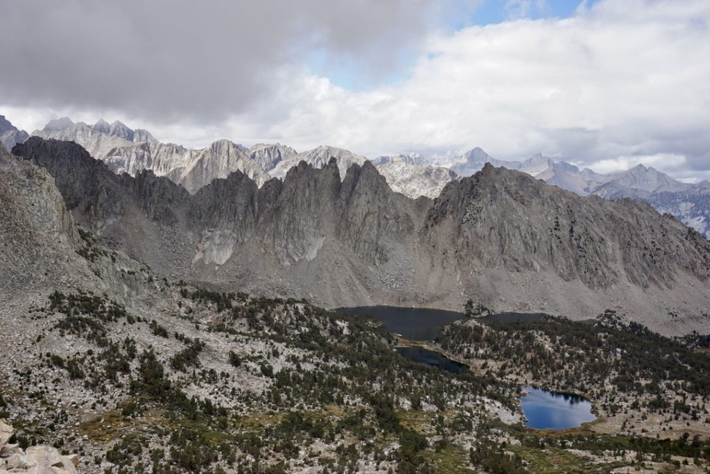 Mountain viewpoint with a lake below and the trees, Onion Valley, High Sierras